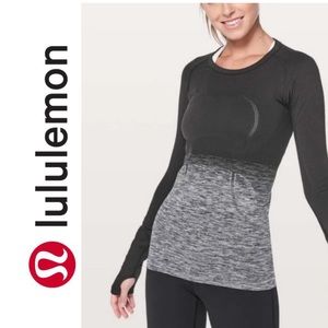 Lululemon Swiftly tech razor back tank top. Size: 6. Color: Black and silver